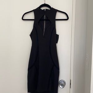 Open back mini black dress. Size S
